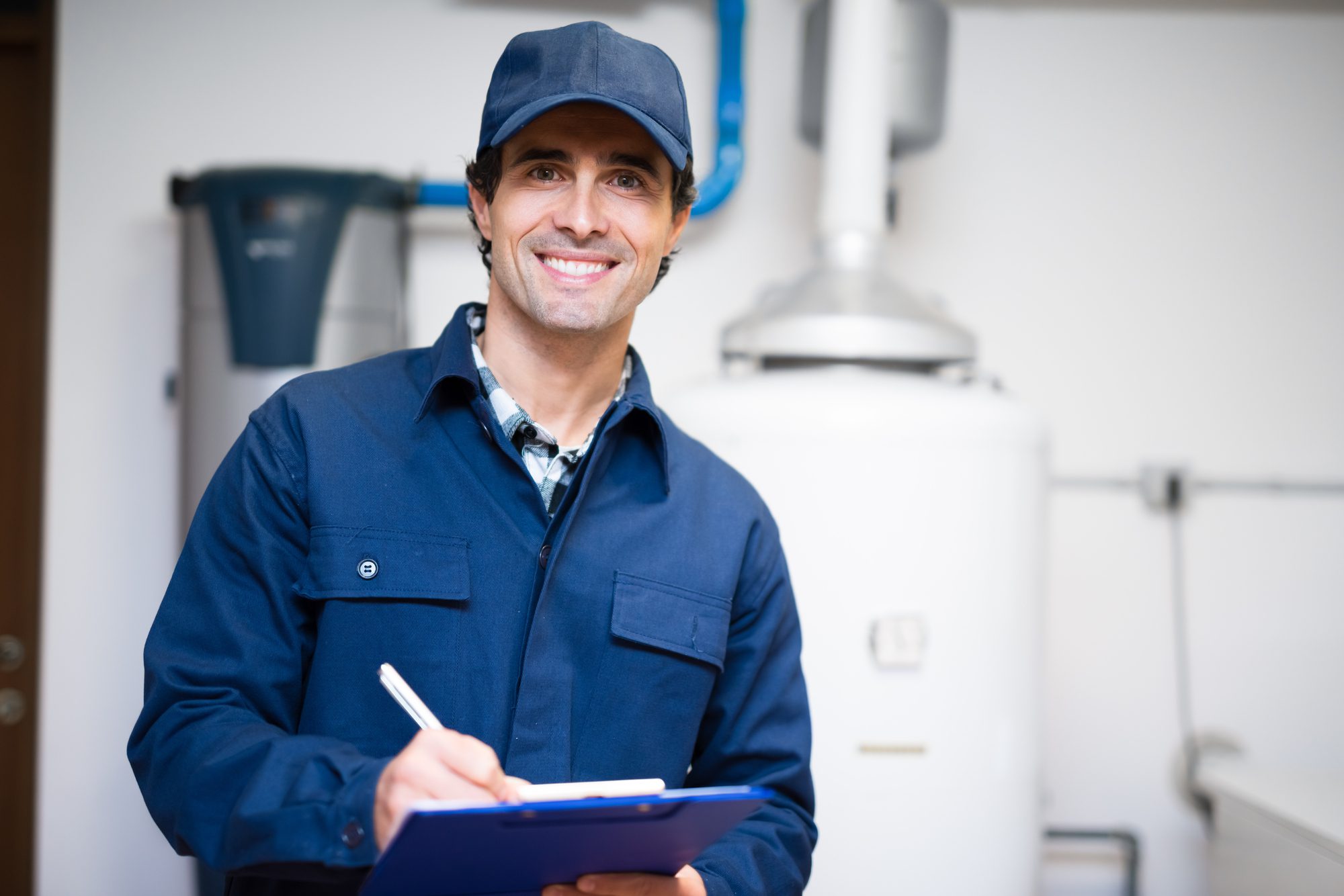Technician Servicing an Hot-Water Heater